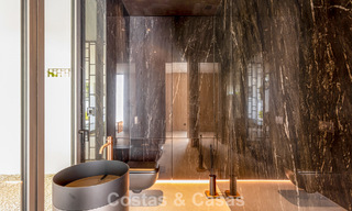 Exclusiva casa con vistas al mar en venta en un complejo moderno con seguridad 24 horas en la Milla de Oro de Marbella 787302 