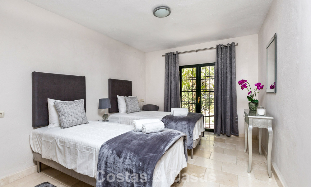 Majestuosa villa de lujo en venta, de estilo andaluz clásico, en una prestigiosa urbanización privada en Benahavís, Marbella 787987