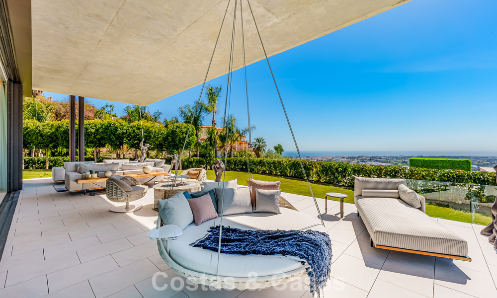 Villa de lujo de alta gama con vistas panorámicas al mar en venta dentro de un prestigioso resort, Benahavís - Marbella 788409