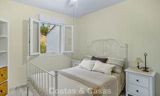 Amplia casa adosada en venta en una encantadora urbanización cerrada en la Milla de Oro de Marbella 789963 