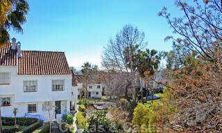Encantadoras casas adosadas en venta en una urbanización privada en la Milla de Oro de Marbella 808418 