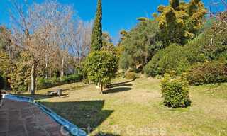 Encantadoras casas adosadas en venta en una urbanización privada en la Milla de Oro de Marbella 808419 