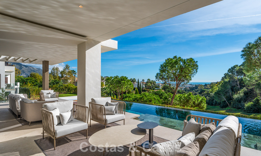 Impresionante villa de lujo con vistas al golf y al mar en venta en La Quinta, Benahavís - Marbella 790199