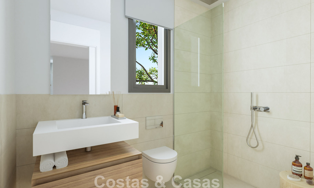 Adosados contemporáneos de diseño moderno en venta en un entorno de golf en Mijas Costa, Costa del Sol 791826