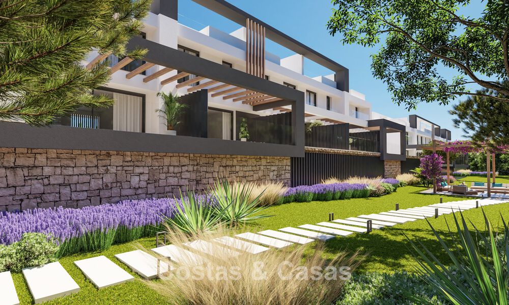 Adosados contemporáneos de diseño moderno en venta en un entorno de golf en Mijas Costa, Costa del Sol 791830