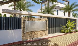 Adosados contemporáneos de diseño moderno en venta en un entorno de golf en Mijas Costa, Costa del Sol 791834 