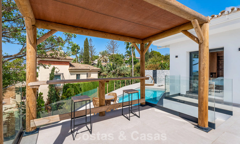 Elegante villa moderna a poca distancia de la playa en venta en Elviria, al este del centro de Marbella 793641