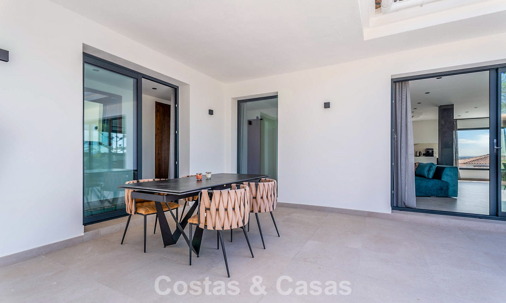 Elegante villa moderna a poca distancia de la playa en venta en Elviria, al este del centro de Marbella 793667