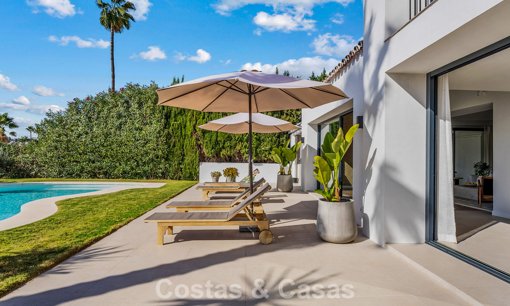 Villa familiar renovada de alta calidad en venta en la codiciada zona de golf de Nueva Andalucía, Marbella 793190