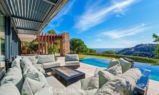 Villa arquitectónica moderna con vistas al mar y un gimnasio profesional en venta en El Madroñal, Benahavís - Marbella 793731 