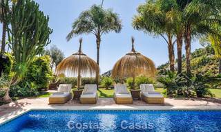 Elegante villa andaluza con vistas panorámicas al mar en venta en El Madroñal, Benahavís - Marbella 793832 