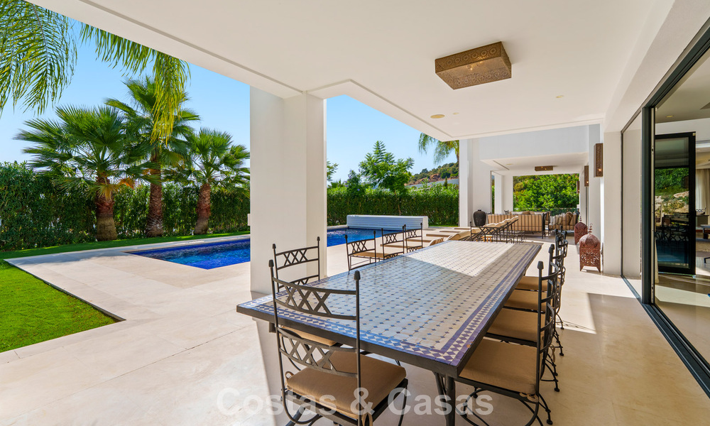 Exclusiva villa de lujo de diseño modernista en venta en el Valle del Golf de Nueva Andalucía, Marbella 793945