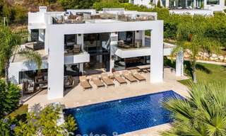Exclusiva villa de lujo de diseño modernista en venta en el Valle del Golf de Nueva Andalucía, Marbella 793961 