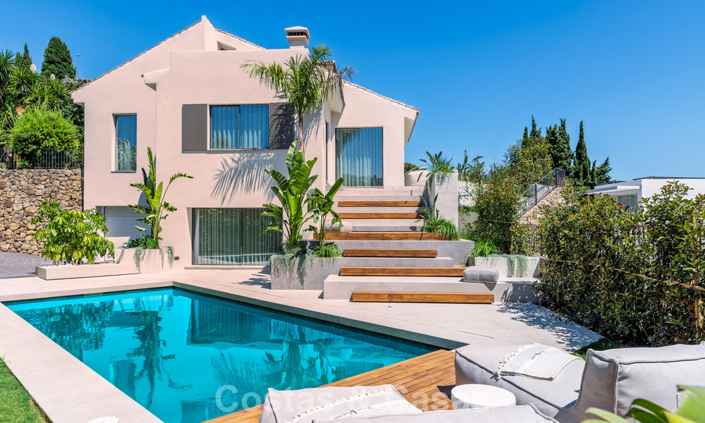 Villa de lujo de estilo balinés, lista para entrar a vivir, en venta en el Valle del Golf de Nueva Andalucía, Marbella 794691