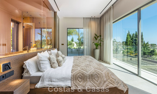 Villa de lujo de estilo balinés, lista para entrar a vivir, en venta en el Valle del Golf de Nueva Andalucía, Marbella 794693 
