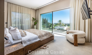 Villa de lujo de estilo balinés, lista para entrar a vivir, en venta en el Valle del Golf de Nueva Andalucía, Marbella 794694 