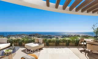 Apartamentos modernos con vistas panorámicas al mar en venta en un resort de golf en Mijas Costa, Costa del Sol 794782 
