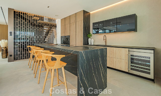 Villa adosada ultramoderna con piscina privada en venta en la Milla de Oro de Marbella 795023 