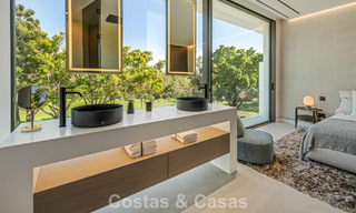 Villa adosada ultramoderna con piscina privada en venta en la Milla de Oro de Marbella 795040 