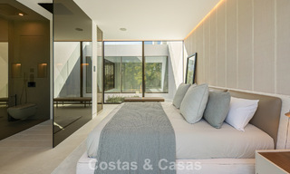 Villa adosada ultramoderna con piscina privada en venta en la Milla de Oro de Marbella 795044 