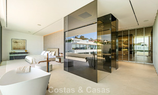 Villa adosada ultramoderna con piscina privada en venta en la Milla de Oro de Marbella 795049 