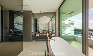 Villa adosada ultramoderna con piscina privada en venta en la Milla de Oro de Marbella 795053 