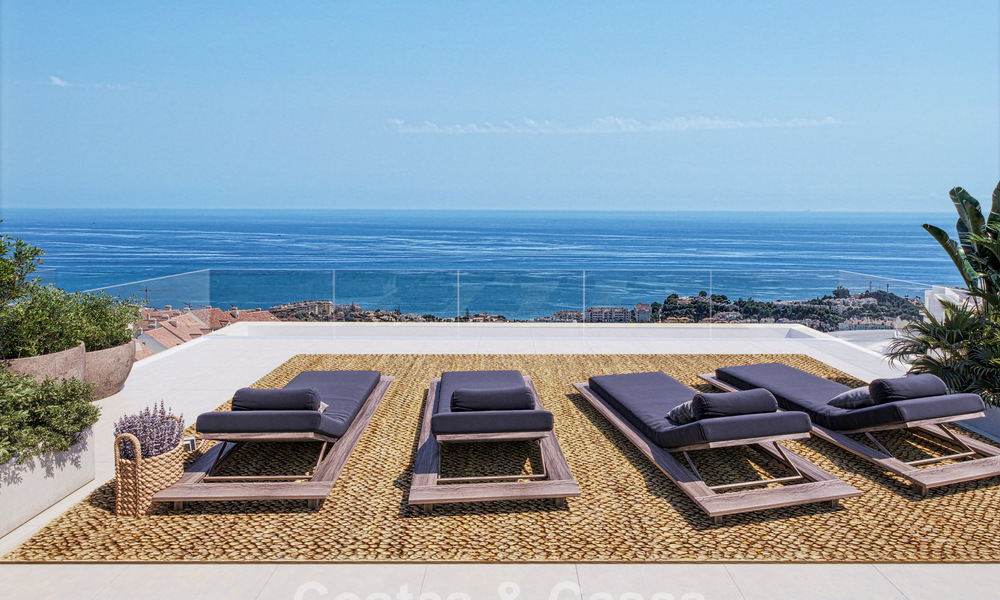 Exclusivas villas pareadas con vistas al mar en venta en un entorno de golf privilegiado en Mijas, Costa del Sol 795281