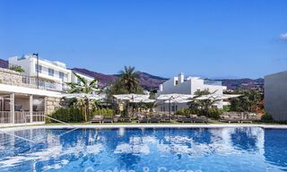 Exclusivas villas pareadas con vistas al mar en venta en un entorno de golf privilegiado en Mijas, Costa del Sol 795297 
