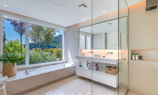 Lujoso apartamento contemporáneo en planta baja con vistas al mar en venta en un complejo boutique cerca de Marbella 795339 