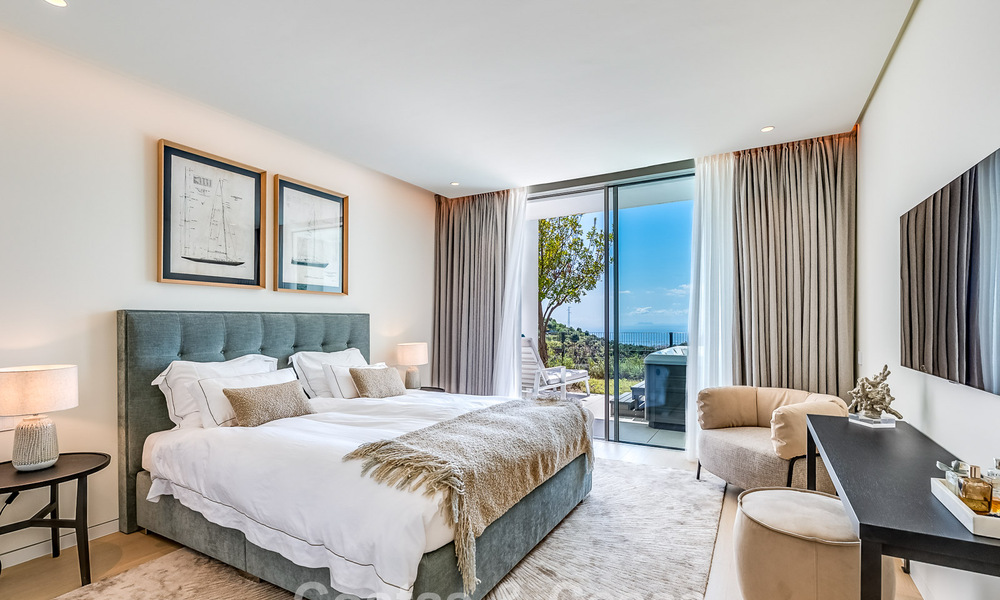 Lujoso apartamento contemporáneo en planta baja con vistas al mar en venta en un complejo boutique cerca de Marbella 795340