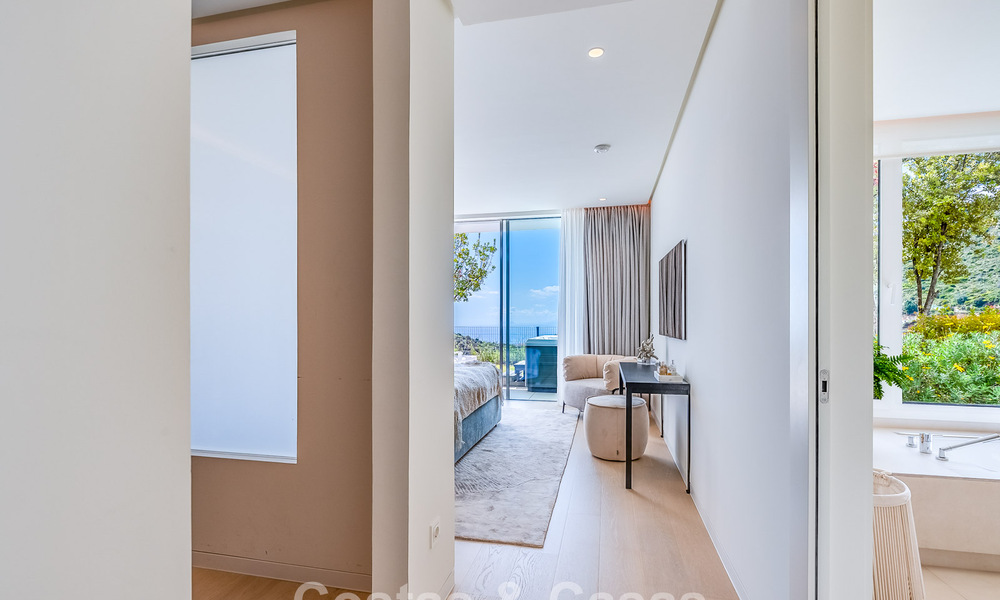 Lujoso apartamento contemporáneo en planta baja con vistas al mar en venta en un complejo boutique cerca de Marbella 795350