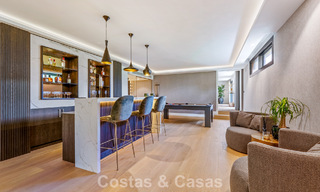 Elegante villa de diseño con vistas panorámicas en venta sobre el valle del golf de Nueva Andalucía, Marbella 795672 