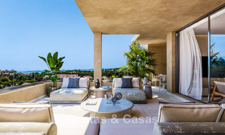 Exclusivos apartamentos de obra nueva con vistas panorámicas al golf y al mar en venta en Benalmádena, Costa del Sol 795441 
