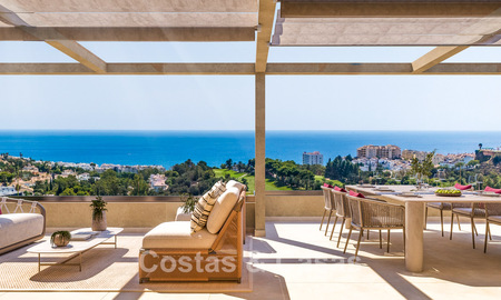Exclusivos apartamentos de obra nueva con vistas panorámicas al golf y al mar en venta en Benalmádena, Costa del Sol 795443