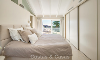 Exclusivo ático dúplex con interior moderno y luminoso en venta en un complejo cerrado en la Milla de Oro, Marbella 796411 