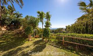 Majestuosa villa modernamente renovada con vistas panorámicas al mar en venta en una amplia parcela al este del centro de Marbella 796550 