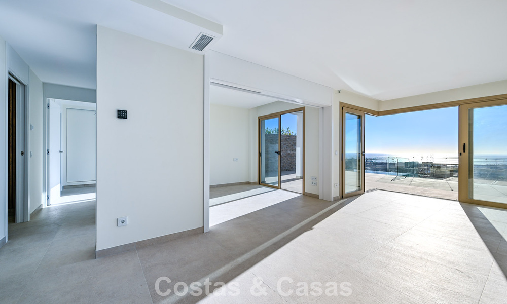 Listo para entrar a vivir! Lujosos apartamentos modernos con vistas panorámicas al mar en venta en Mijas, en la Costa del Sol 797106
