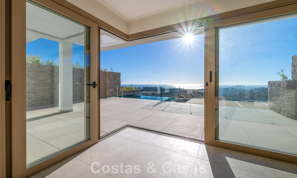 Listo para entrar a vivir! Lujosos apartamentos modernos con vistas panorámicas al mar en venta en Mijas, en la Costa del Sol 797110