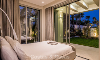 Exclusiva villa moderna en primera línea de playa en venta con acceso directo al mar en Mijas, Costa del Sol 797391 