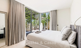 Exclusiva villa moderna en primera línea de playa en venta con acceso directo al mar en Mijas, Costa del Sol 797392 