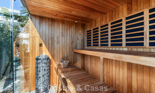 Exclusiva villa moderna en primera línea de playa en venta con acceso directo al mar en Mijas, Costa del Sol 797398 