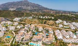 Lujoso apartamento dúplex con 4 dormitorios en venta en un complejo residencial en Nueva Andalucía, Marbella 798419 