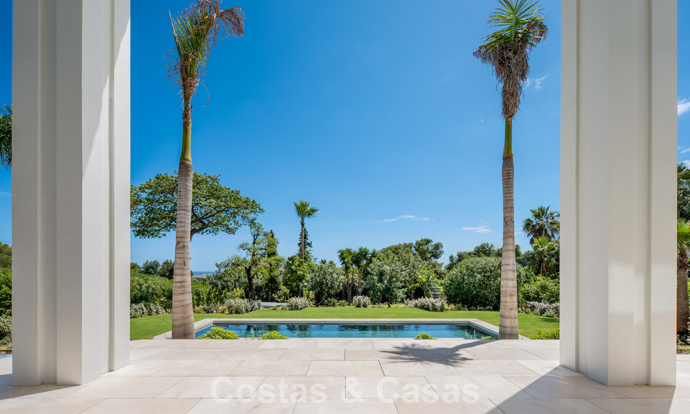 Nueva villa arquitectónica, moderna y de diseño, con impresionantes vistas al mar en venta en la Milla de Oro de Marbella 799330