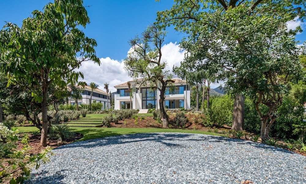 Nueva villa arquitectónica, moderna y de diseño, con impresionantes vistas al mar en venta en la Milla de Oro de Marbella 799334