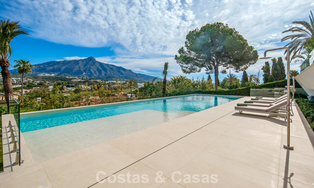 Villa contemporánea de diseño con vistas panorámicas en venta en el Valle del Golf de Nueva Andalucía, Marbella 800171