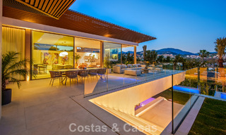 Villa contemporánea de diseño con vistas panorámicas en venta en el Valle del Golf de Nueva Andalucía, Marbella 800191 