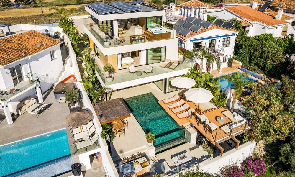 Villa moderna de lujo reformada con impresionantes vistas en venta en Nueva Andalucía, Marbella 800361