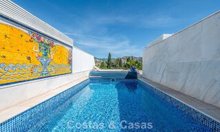 Ático dúplex de alta gama en venta en un exclusivo complejo de golf en Nueva Andalucía, Marbella 800994 