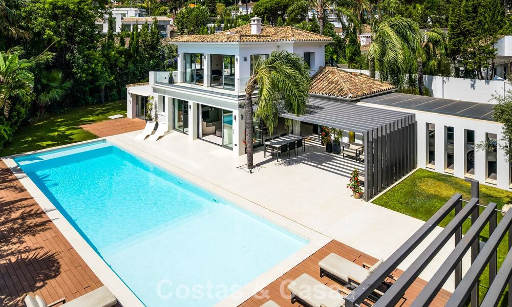 Villa moderna de lujo con piscina climatizada en venta en el Valle del Golf de Nueva Andalucía, Marbella 801998
