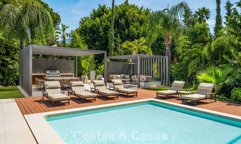 Villa moderna de lujo con piscina climatizada en venta en el Valle del Golf de Nueva Andalucía, Marbella 802001